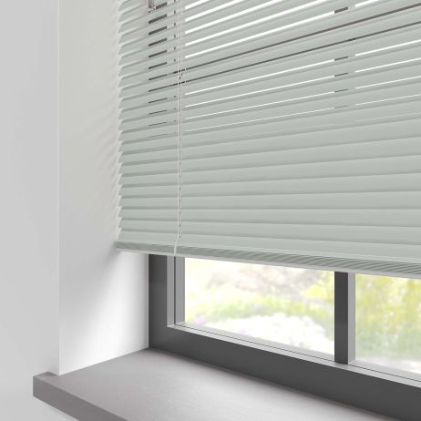 A softer grey aluminium blind in the kitchen 